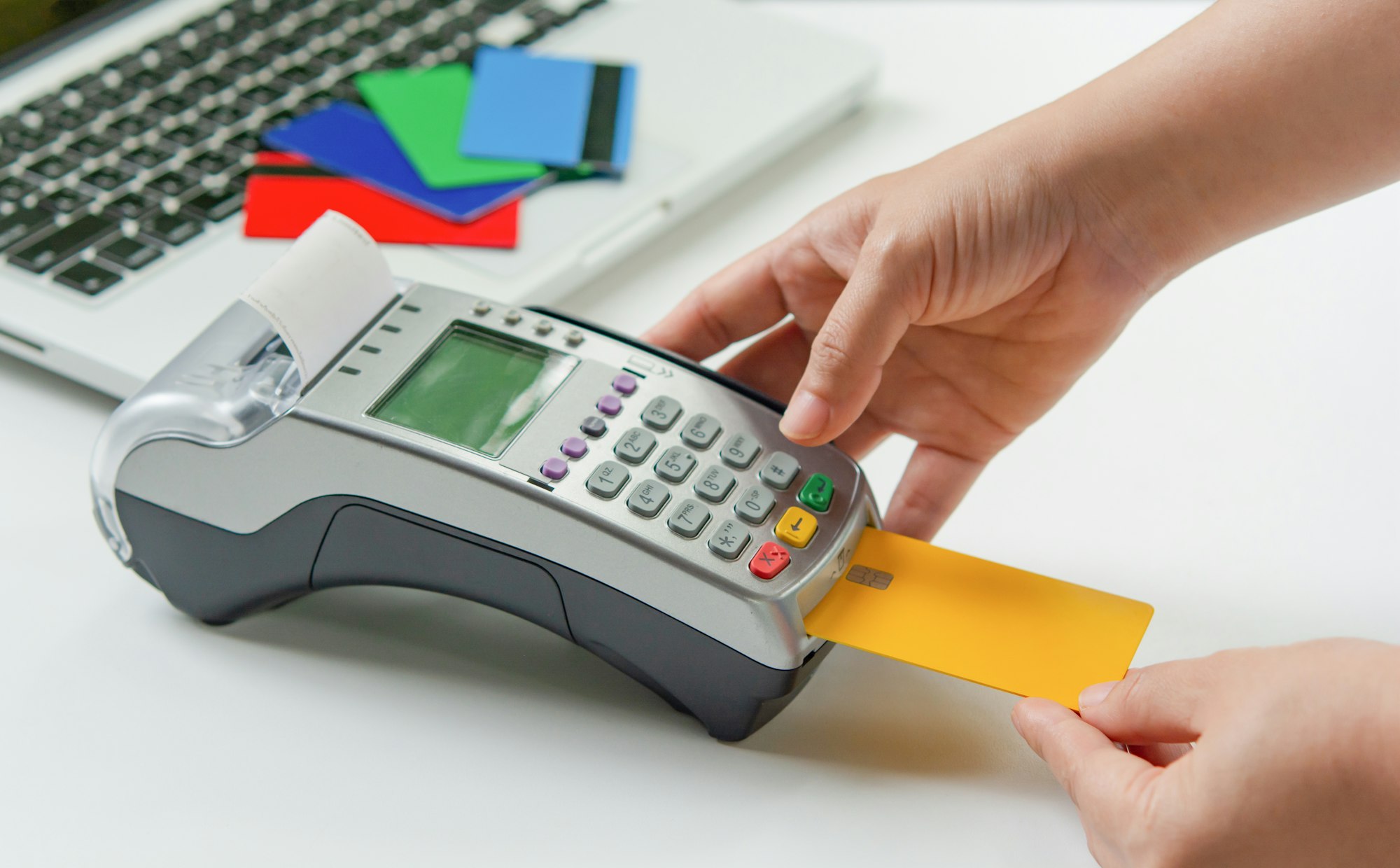 Credit card payment with EDC machine or credit card terminal.